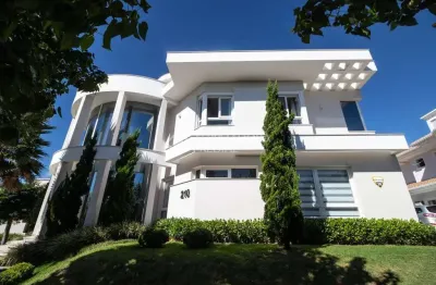 Casa com 4 quartos à venda na avenida dos dourados, 210, jurerê internacional, florianópolis, 429 m2 por r$ 8.200.000