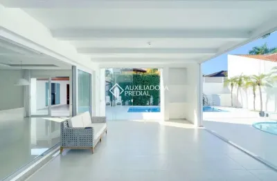 Casa com 5 quartos à venda na avenida dos búzios, 2660, jurerê internacional, florianópolis, 485 m2 por r$ 7.850.000