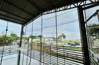 Terreno frente ao mar com salão e quadra coberta! Ideal para academia ou comércio