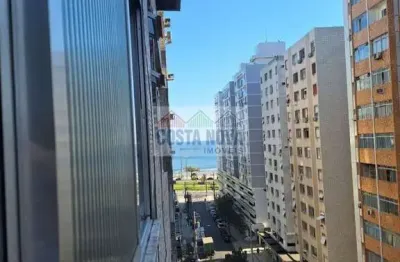 Excelente apartamento à venda na Ponta da Praia, com 136 m², andar alto e vista parcial do mar