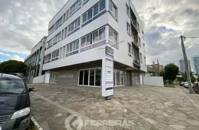 Invista com segurança: sala comercial já locada no centro de tramandaí!