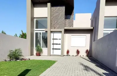 Casa de alto padrão de 3 dormitórios a venda na linda praia de imbé