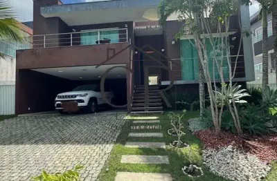 Oportunidade ímpar, linda casa no alphavile litoral norte, porteira fechada!