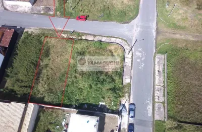 Terreno região central de ilha comprida, rua asfaltada, escritura e licença de muro e calçada