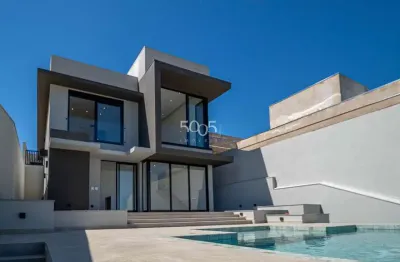 Casa em construção à venda no condomínio saint paul com 268m² de área construída e 564m² de área total.