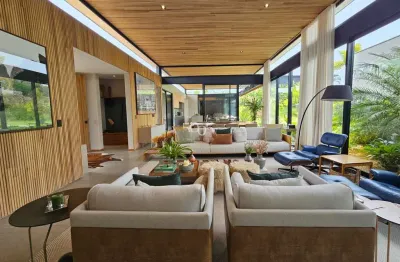 Lindo projeto de casa térrea contemporânea à venda no condomínio terras de são josé ii com 2160m2 de terreno e 585m2 de construção.