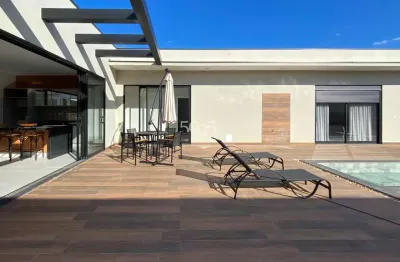 Casa à venda no condomínio xapada parque ytu, com 380m² de construção e 4 suítes