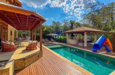 Casa à venda no condomínio fazenda vila real, com 499m² e 5 suítes