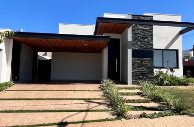 Casa moderna com pé-direito duplo, suítes amplas e infraestrutura para piscina no Village Damha 3