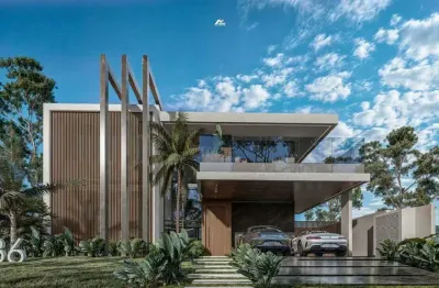 Casa alto padrão de acabamento no condomínio caledônia em camboriú para venda.