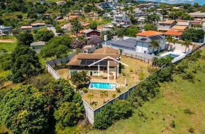 Chácara com 4 dormitórios à venda, 1244 m² por r$ 1.500.000,00 - condomínio village d' atibaia - atibaia/sp