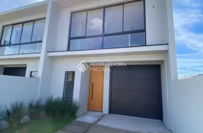 Casa com 3 quartos à venda na Rua Jovelino Marques da Silva, 25, Dom Feliciano, Gravataí, 132 m2 por R$ 550.000