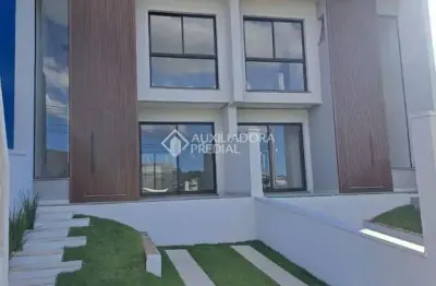 Casa com 3 quartos à venda na Rua Luiz Toledo, 299, Dom Feliciano, Gravataí, 100 m2 por R$ 690.000