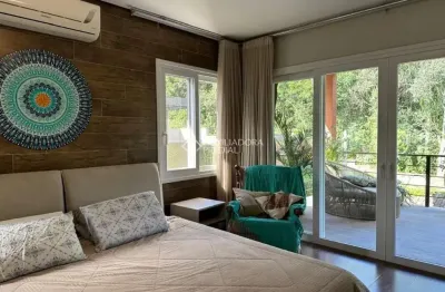 Casa em condomínio fechado com 3 quartos à venda na avenida senador salgado filho, 8500, querência, viamão, 420 m2 por r$ 1.700.000