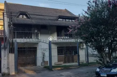 Casa com 4 quartos à venda na Rua Professor Guerreiro Lima, 1010, Partenon, Porto Alegre, 389 m2 por R$ 1.100.000