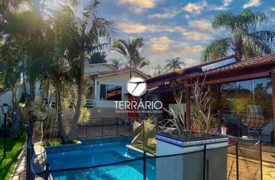 Casa à venda no lagamar em varginha com piscina, churrasqueira, 4 quartos e 2 suítes em condomínio fechado.