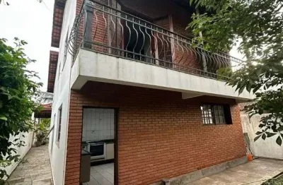 Casa com 4 quartos à venda na catalão, 79, vila voturua, são vicente por r$ 1.350.000