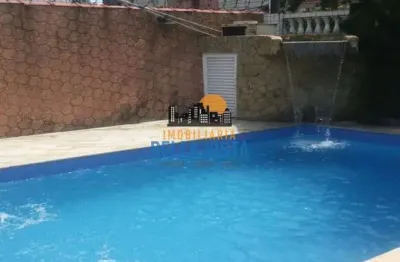 Casa com 4 quartos à venda na rua general san martin, 38, jardim independência, são vicente por r$ 1.080.000