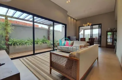 Casa térrea com 3 dormitórios localizada no condomínio portal das tipuanas.