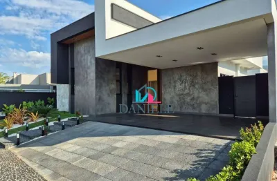 Casa térrea com 3 suítes localizada no condomínio damha.