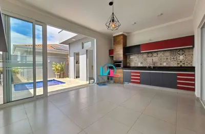 Casa térrea com 3 suítes localizada no condomínio village damha ii.