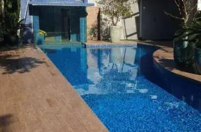 Sobrado com 6 dormitórios à venda, 575 m² por R$ 7.300.000,00 - Riviera de São Lourenço - Bertioga/SP