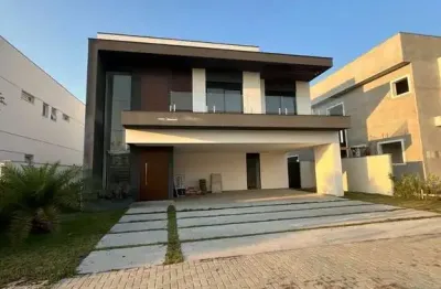 Casa no alphaville 1 - urbanova, com 548 m² de terreno e 450 m² de área construída, incluindo piscina