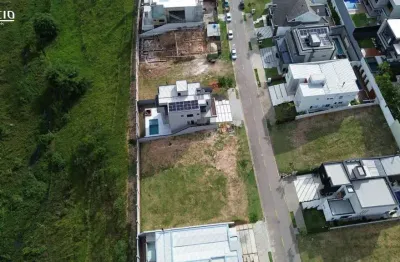 Terreno à venda no condomínio alphaville 2, com 467 m2 em declive localizado na reserva do condomínio.