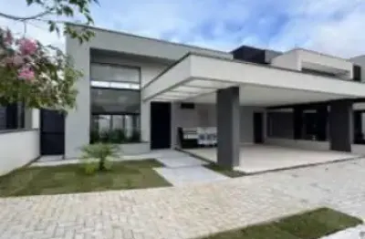 Casa térrea no condomínio reserva aruanã bairro floresta com 165m, 3 dormitórios, 3 suítes