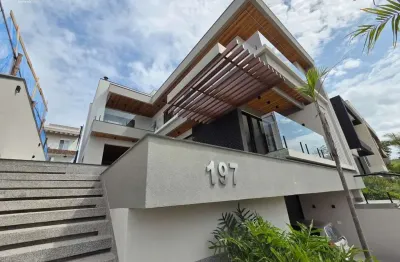 Sobrado no alphaville 1 com 3 pavimentos, 495 m² de construção