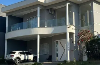 Sobrado no condominio vivva em jacareí com vista permanente para o lago e projeto de interiores assinado