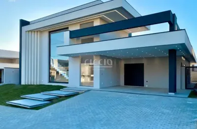 Impecável sobrado à venda no condomínio colinas do paratehy norte - 3 suítes - 363 m² de construção e 600 m² de terreno