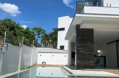 Casa de alto padrão à venda - 3 suites piscina - cond. alphaville 1