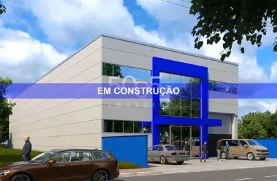 Galpão industrial em construção para alugar, com 700m² de área construída e 1.000m² de área total