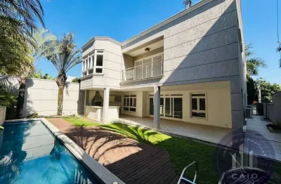 Casa com 4 dormitórios para alugar, 470m² por r$ 26.500/mês - alphaville/sp