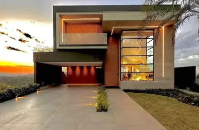 Luxuosa casa no condomínio gênesis ii - 490m² de terreno com vista p/ mata.