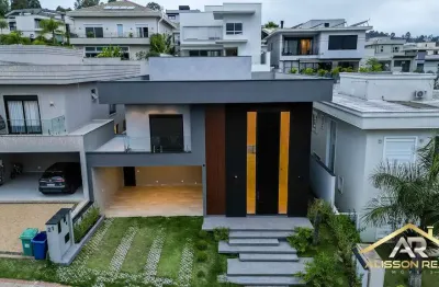 Sobrado de alto padrão localizado no residencial itahye, 5 suítes.