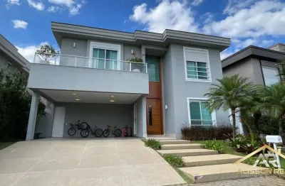 Casa em condomínio, com 4 sts, 6 wc, 4 vagas - 411m² - resid. tamboré 10.