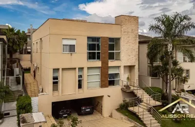 Linda casa com 5 suítes, 7 banheiros, com 441m² em alphaville - sp.