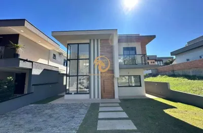 Belíssima casa á venda , sendo 03 suítes no condomínio terras de atibaia