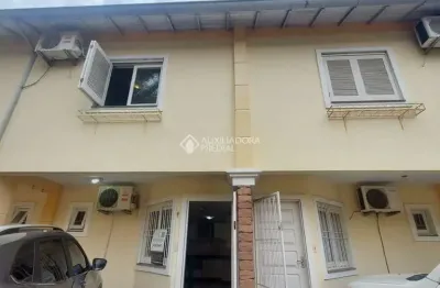 Casa em condomínio fechado com 2 quartos para alugar na rua gomes freire de andrade, 616, nossa senhora das graças, canoas, 73 m2 por r$ 2.000