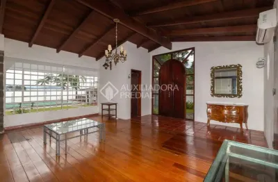 Casa em condomínio fechado com 4 quartos para alugar na rua vicente failace, 21, tristeza, porto alegre, 370 m2 por r$ 8.000