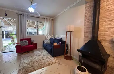 Casa em condomínio fechado com 2 quartos para alugar na Rua Treze de Maio, 630, Rio Branco, Canoas, 106 m2 por R$ 2.300