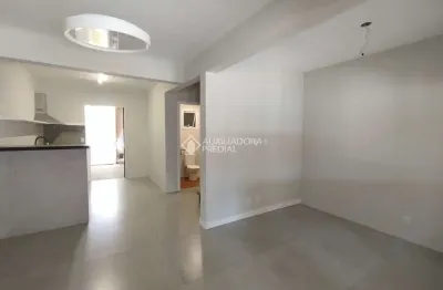 Casa em condomínio fechado com 2 quartos para alugar na Rua Henrique Stefani, 801, Igara, Canoas, 75 m2 por R$ 2.100