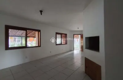 Casa em condomínio fechado com 3 quartos para alugar na Rua Ilha Graciosa, 125, Olaria, Canoas, 72 m2 por R$ 2.200