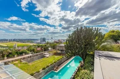 Casa em condomínio fechado com 4 quartos para alugar na rua curupaiti, 113, cristal, porto alegre, 400 m2 por r$ 18.000