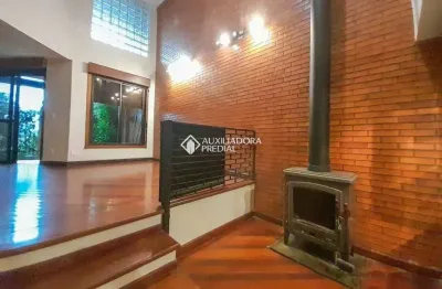 Casa em condomínio fechado com 3 quartos para alugar na avenida jacuí, 978, cristal, porto alegre, 359 m2 por r$ 5.500