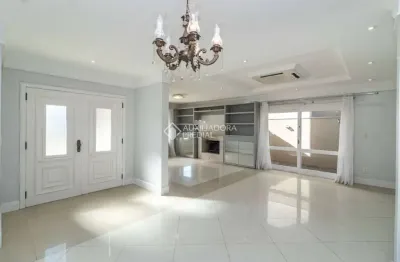 Casa em condomínio fechado com 3 quartos para alugar na avenida juca batista, 8000, belém novo, porto alegre, 217 m2 por r$ 11.500