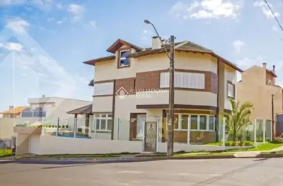Casa em condomínio fechado com 3 quartos para alugar na rua heitor kramer, 540, guarujá, porto alegre, 290 m2 por r$ 5.500