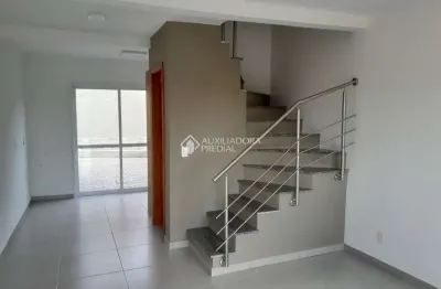 Casa em condomínio fechado com 2 quartos para alugar na rua miguel ascoleze, 125, vila nova, porto alegre, 65 m2 por r$ 2.500